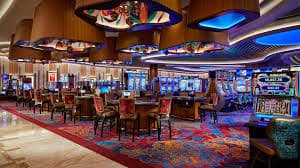 Tampilan meja Sakong live dealer di platform dayak toto dengan dealer dan area taruhan pemain
